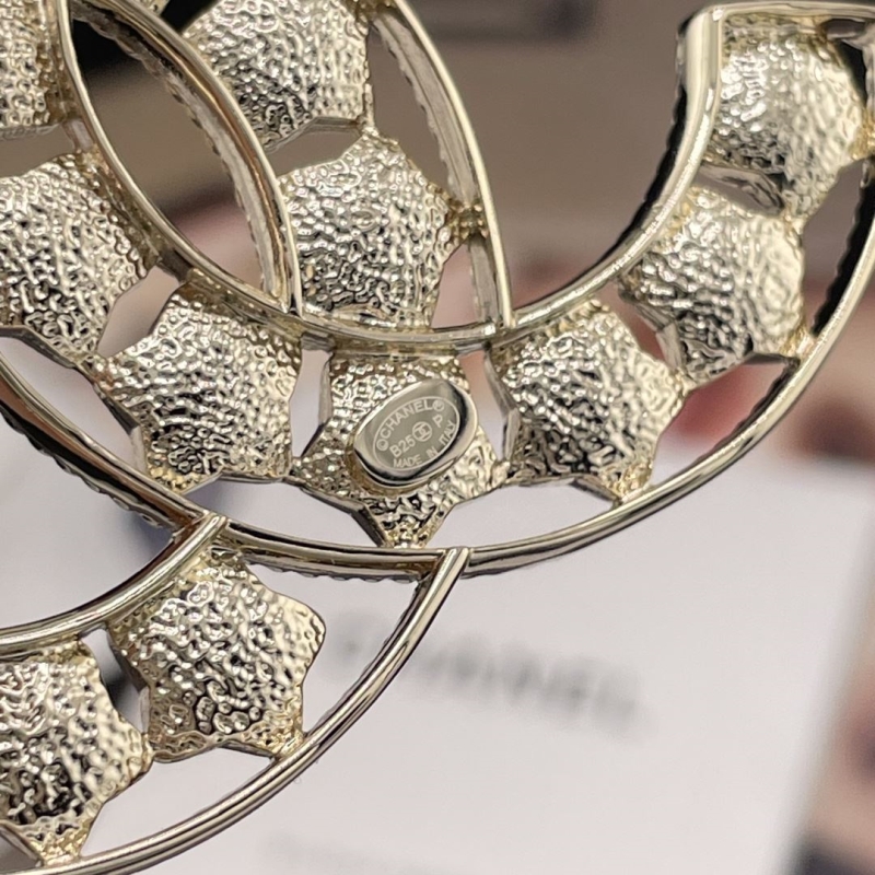 Ch**el brooches
